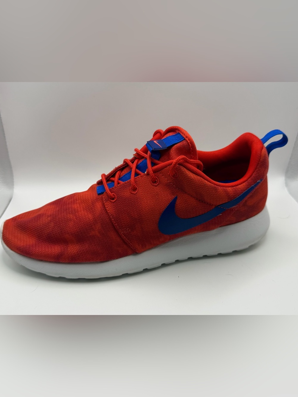 Nike Red Athletic Sneaker with Blue Swoosh